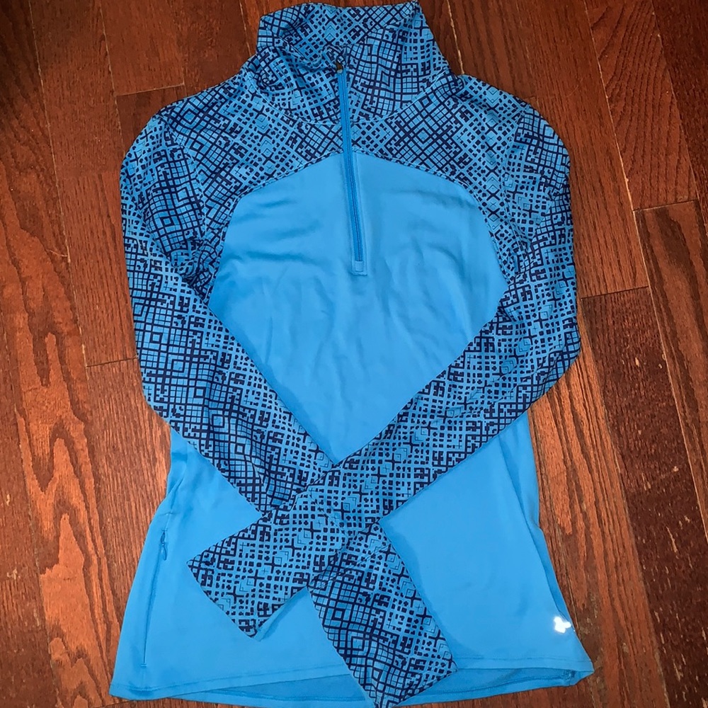 Under Armour half zip. Size large. Excellent condition.